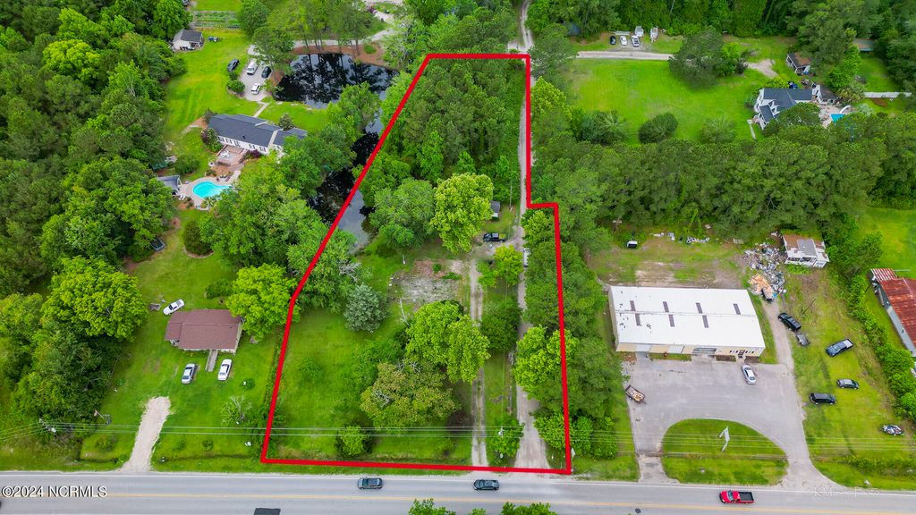 Photo of 128 Seaside Road SW, Sunset Beach, NC 28468 (MLS # 100521670)