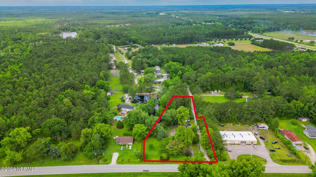 Photo of 128 Seaside Road SW, Sunset Beach, NC 28468 (MLS # 100521670)