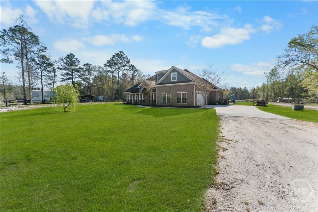 Photo of 875 Zittrouer Rd, Guyton, GA 31312 (MLS # SA352277)