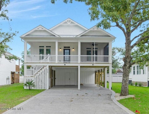 Photo of 112 NE 27th Street, Oak Island, NC 28465 (MLS # 100588476)