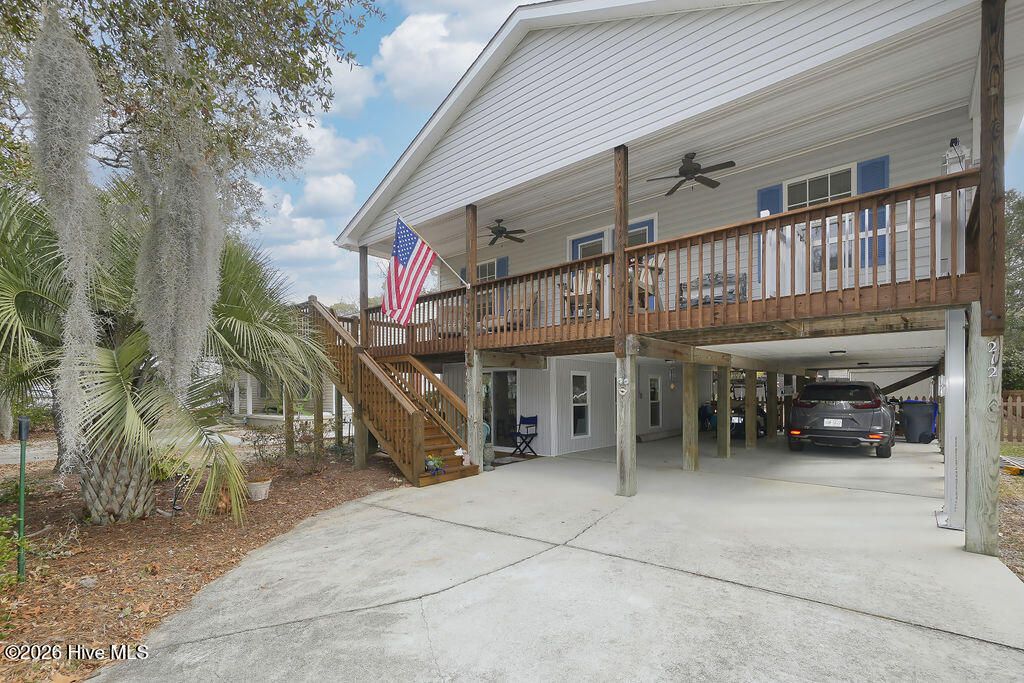 Photo of 212 NE 48th Street, Oak Island, NC 28465 (MLS # 100551921)