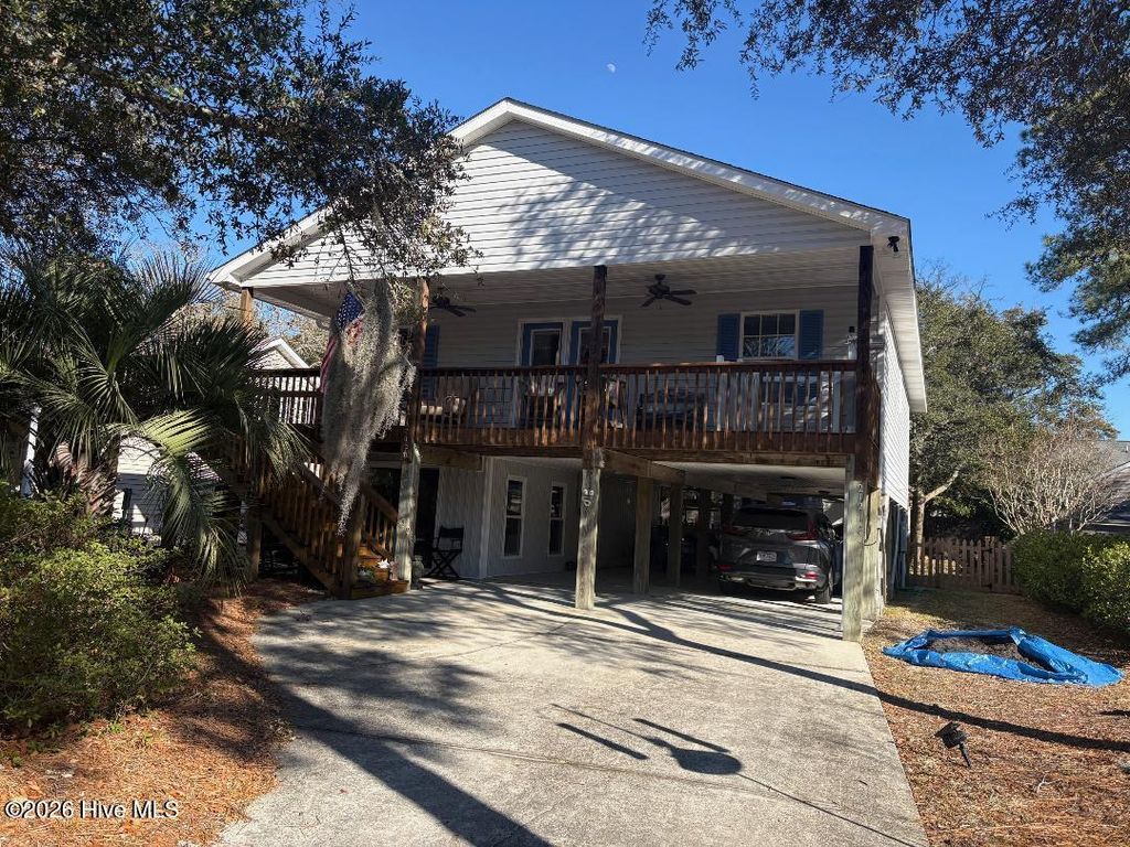 Photo of 212 NE 48th Street, Oak Island, NC 28465 (MLS # 100551921)