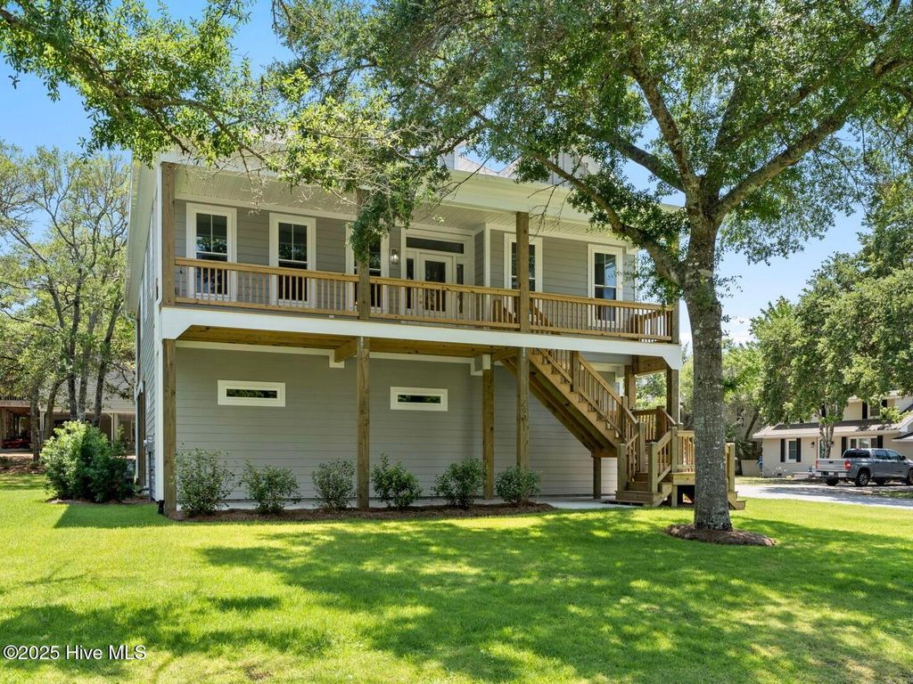 Photo of 2401 E Yacht Drive, Oak Island, NC 28465 (MLS # 100486370)