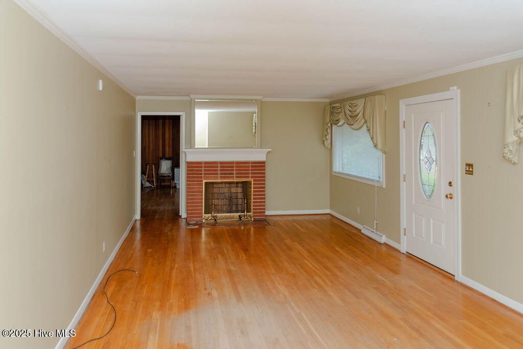 Photo of 303 Dogwood Lane, Hamlet, NC 28345 (MLS # 100533335)