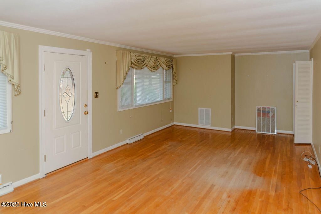 Photo of 303 Dogwood Lane, Hamlet, NC 28345 (MLS # 100533335)