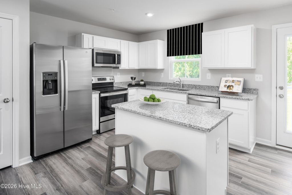 Photo of 853 Haw Creek Avenue NE, Winnabow, NC 28479 (MLS # 100565452)