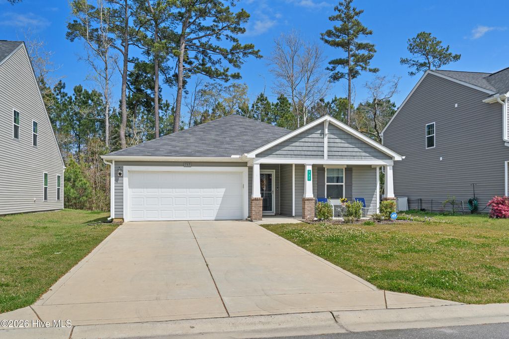 Photo of 737 Landmark Cove, Carolina Shores, NC 28467 (MLS # 100563374)