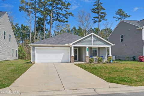 Photo of 737 Landmark Cove, Carolina Shores, NC 28467 (MLS # 100563374)