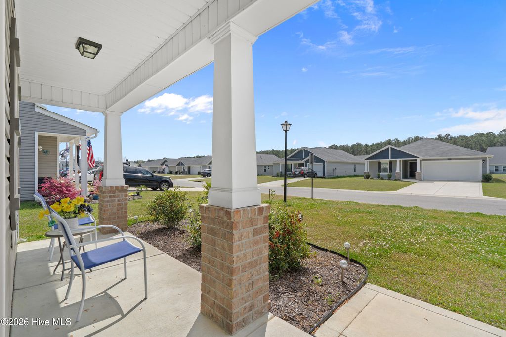 Photo of 737 Landmark Cove, Carolina Shores, NC 28467 (MLS # 100563374)