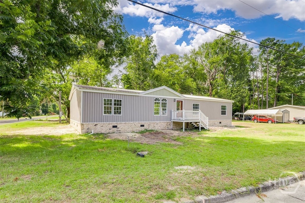 Photo of 318 Samuel Smalls Sr Avenue, Guyton, GA 31312 (MLS # SA360059)