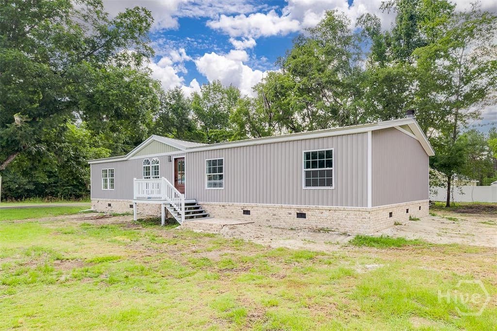 Photo of 318 Samuel Smalls Sr Avenue, Guyton, GA 31312 (MLS # SA360059)