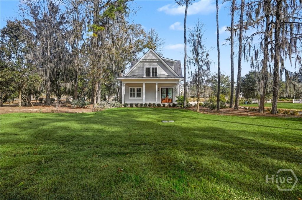 Photo of 576 Silk Hope Drive, Richmond Hill, GA 31324 (MLS # SA348729)