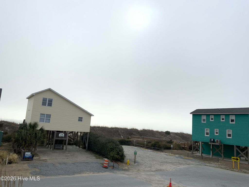Photo of 1104 Ocean Drive, Oak Island, NC 28465 (MLS # 100555608)