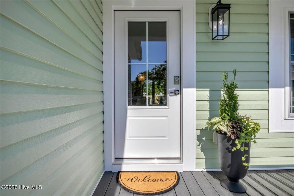 Photo of 147 NE 19th Street, Oak Island, NC 28465 (MLS # 100572343)