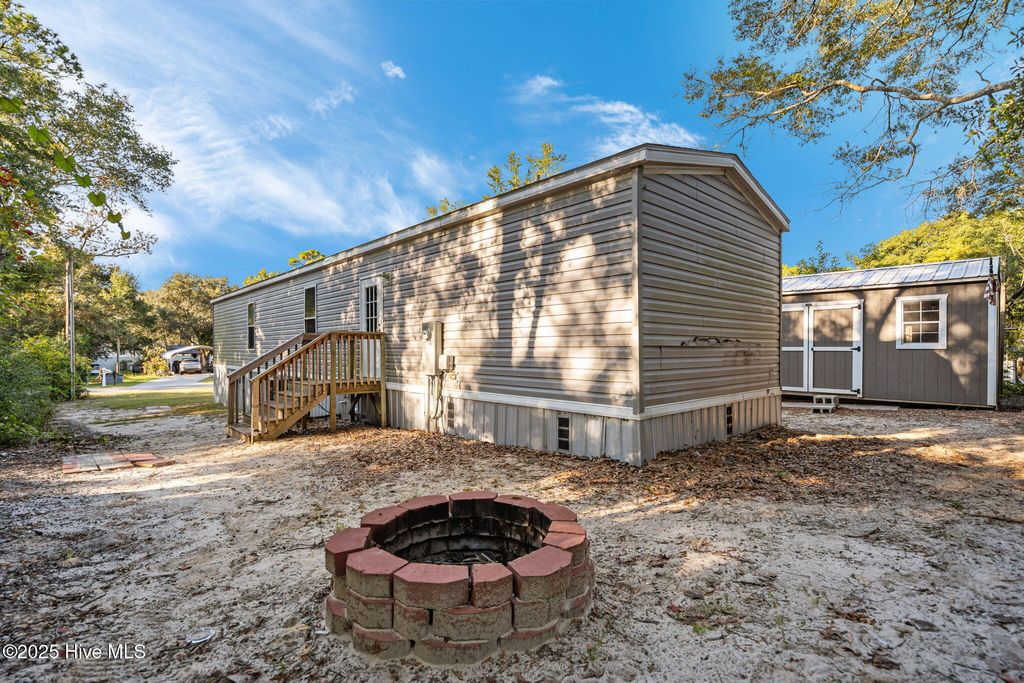 Photo of 644 Harbor Drive SE, Bolivia, NC 28422 (MLS # 100547370)