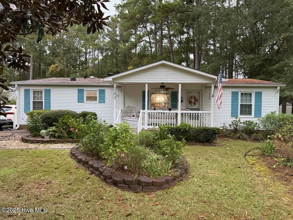 Photo of 243 Ocean Forest Drive NW, Calabash, NC 28467 (MLS # 100538513)