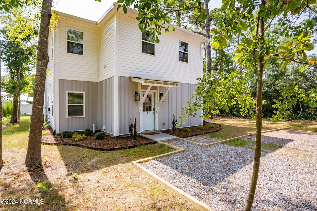 Photo of 238 NE 70th Street, Oak Island, NC 28465 (MLS # 100565543)