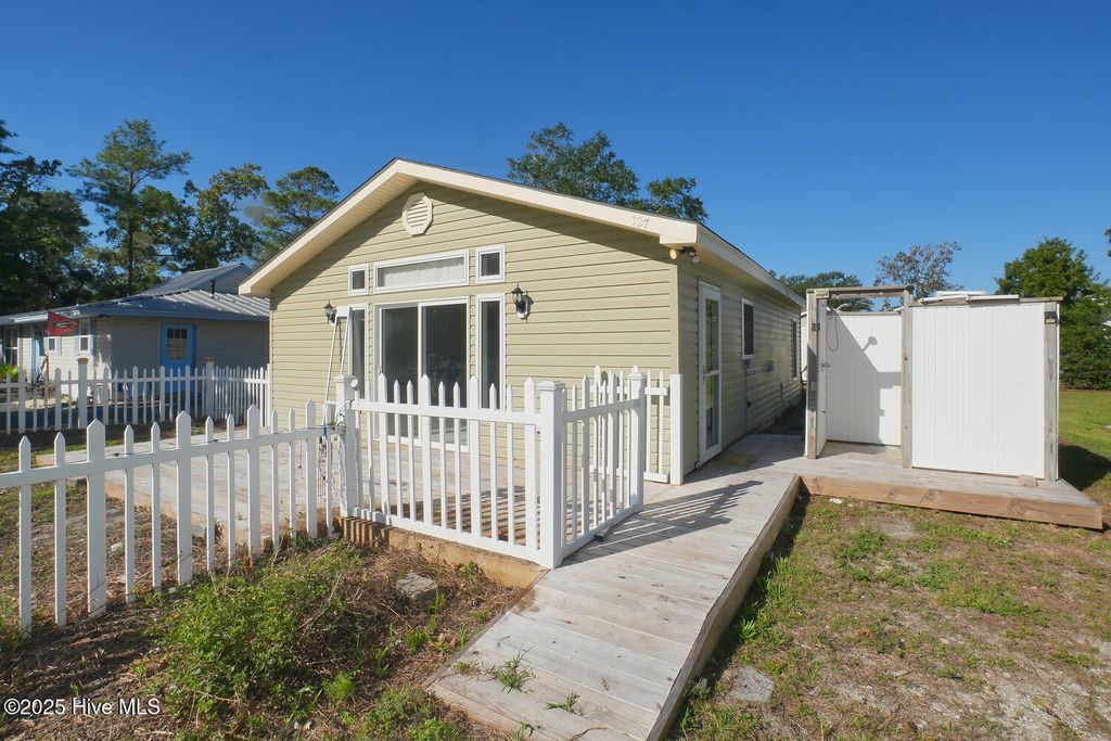 Photo of 127 NW 10th Street, Oak Island, NC 28465 (MLS # 100534468)