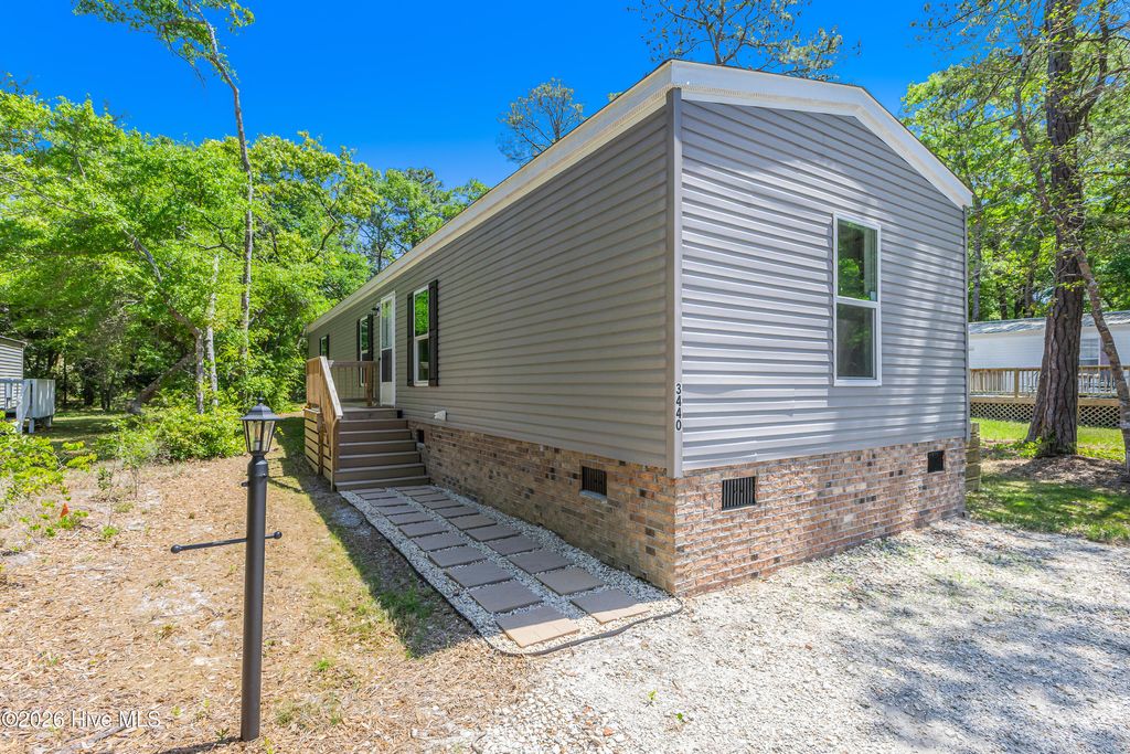 Photo of 3440 Dolphin Drive, Bolivia, NC 28422 (MLS # 100568347)
