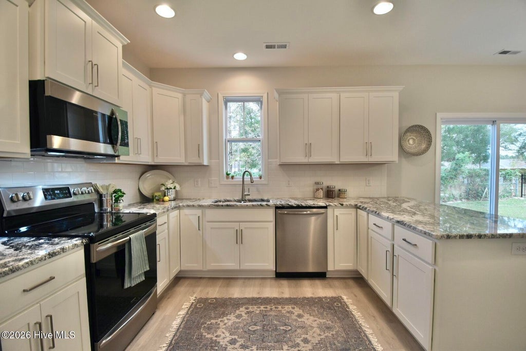 Photo of 1026 Paddington Avenue NE, Leland, NC 28451 (MLS # 100580672)