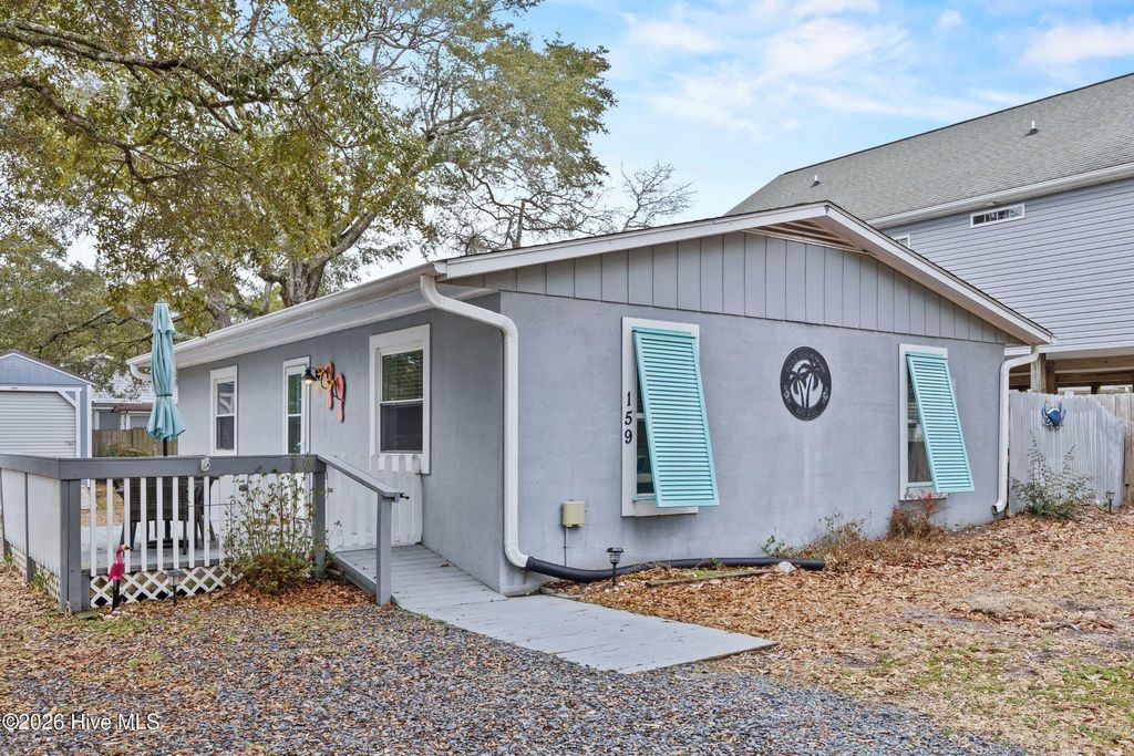 Photo of 159 NW 4th Street, Oak Island, NC 28465 (MLS # 100554331)