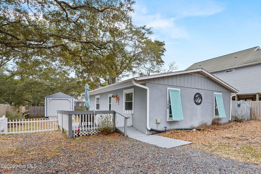 Photo of 159 NW 4th Street, Oak Island, NC 28465 (MLS # 100554331)
