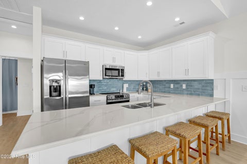 Tiny photo for 711 N Topsail Drive, Surf City, NC 28445 (MLS # 100606843)