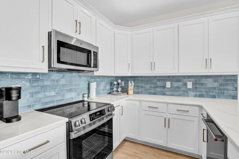 Tiny photo for 711 N Topsail Drive, Surf City, NC 28445 (MLS # 100606843)