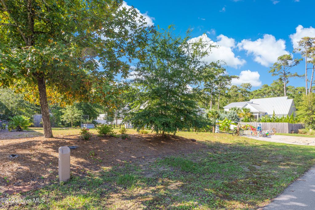 Photo of 127 NW 25th Street, Oak Island, NC 28465 (MLS # 100474045)