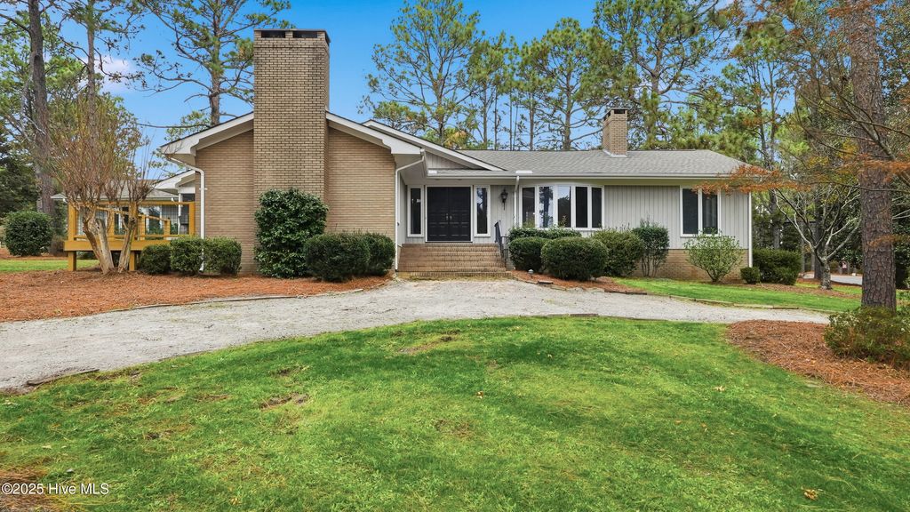 Photo of 1 Country Club Boulevard, Whispering Pines, NC 28327 (MLS # 100542456)