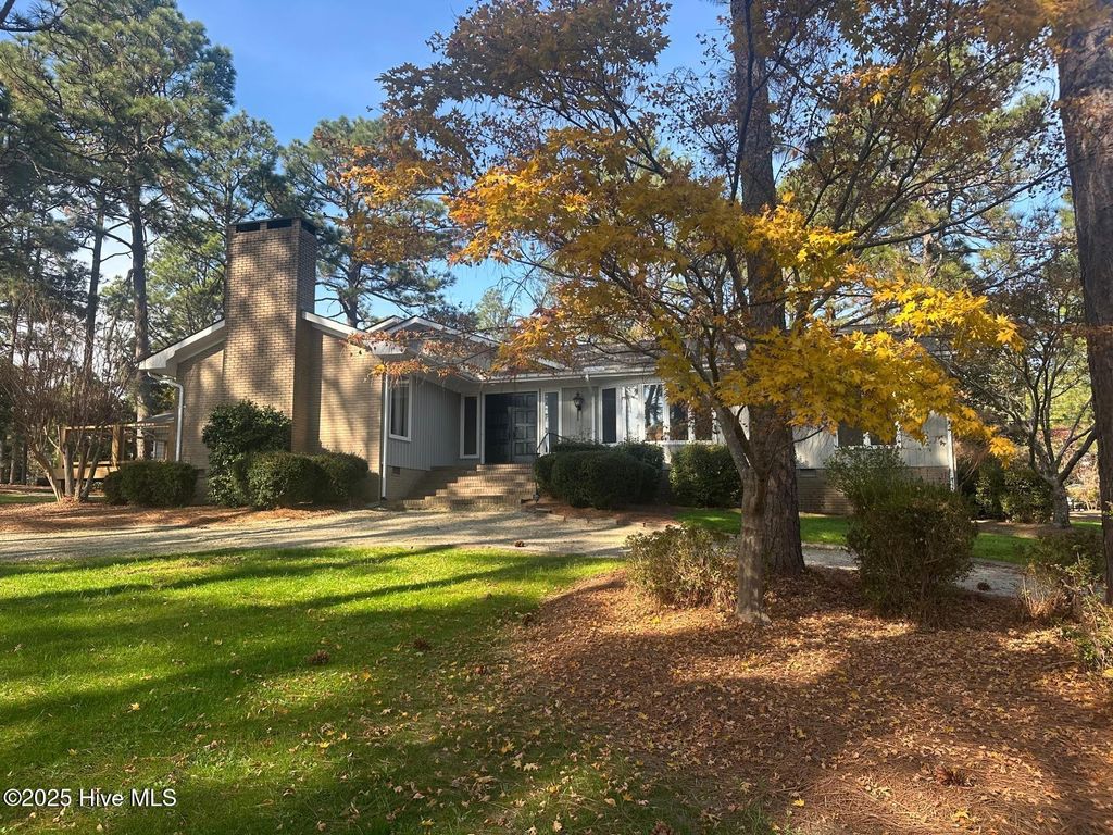 Photo of 1 Country Club Boulevard, Whispering Pines, NC 28327 (MLS # 100542456)