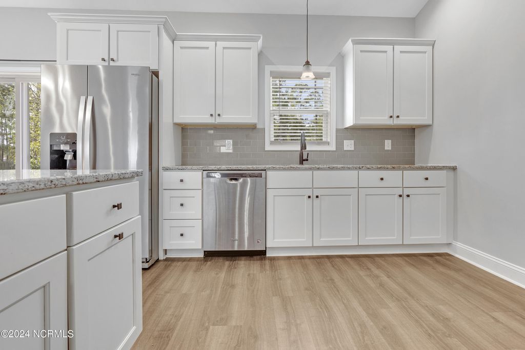 Photo of 272 Marsh Haven Drive, Sneads Ferry, NC 28460 (MLS # 100561583)