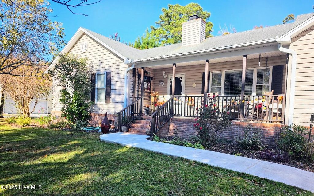 Photo of 410 Masters Lane, Hampstead, NC 28443 (MLS # 100540001)