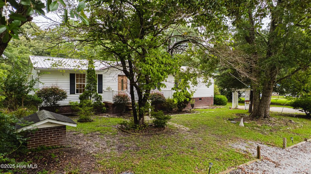Photo of 4974 Peregrine Drive SW, Shallotte, NC 28470 (MLS # 100524257)