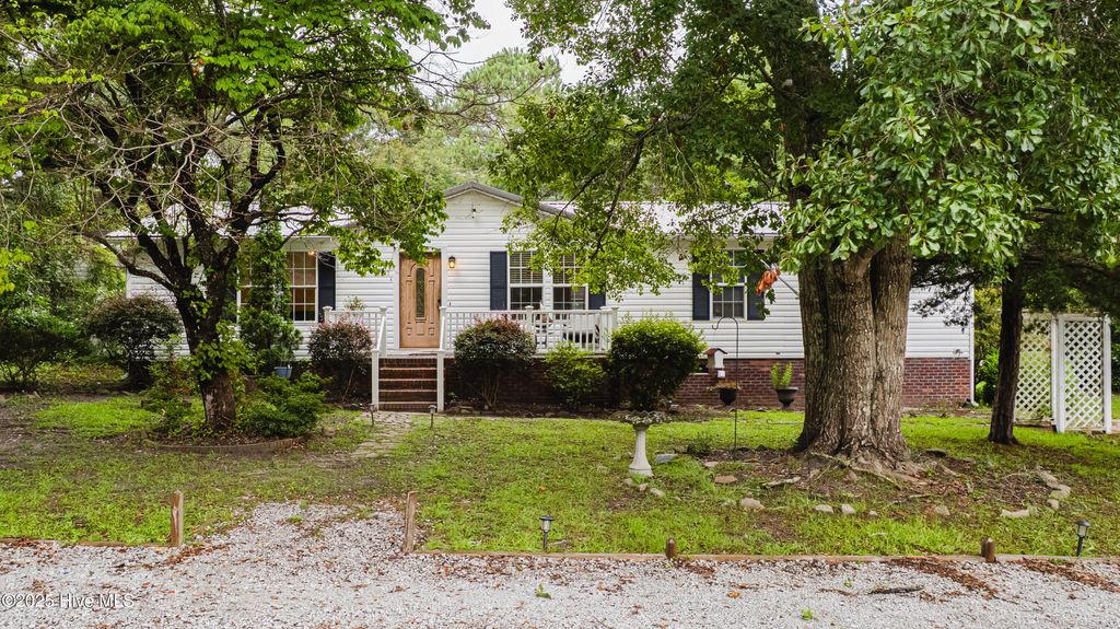 Photo of 4974 Peregrine Drive SW, Shallotte, NC 28470 (MLS # 100524257)