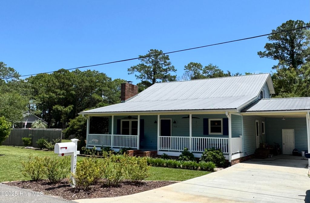 Photo of 712 Longleaf Drive, Southport, NC 28461 (MLS # 100513124)