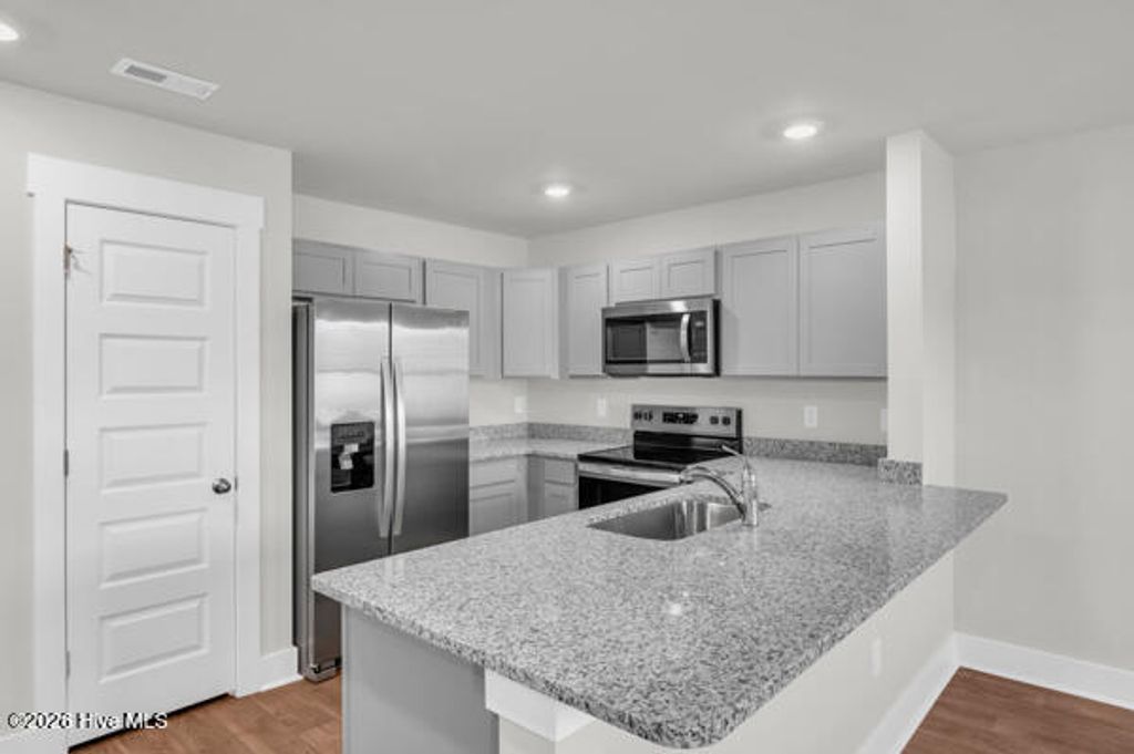 Photo of 109 N Grassland Road, Surf City, NC 28445 (MLS # 100567985)