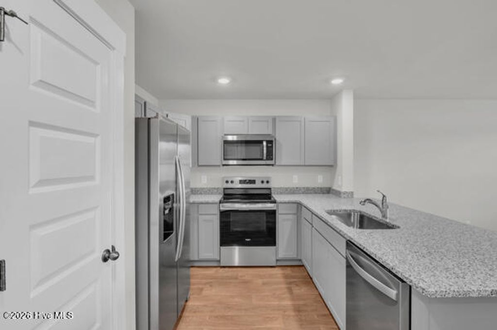 Photo of 109 N Grassland Road, Surf City, NC 28445 (MLS # 100567985)