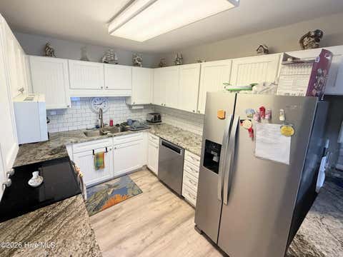 Tiny photo for 513 Canal Drive #Unit A1, Carolina Beach, NC 28428 (MLS # 100589445)