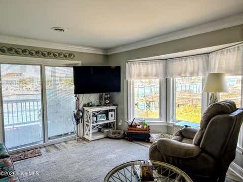 Tiny photo for 513 Canal Drive #Unit A1, Carolina Beach, NC 28428 (MLS # 100589445)