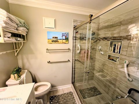 Tiny photo for 513 Canal Drive #Unit A1, Carolina Beach, NC 28428 (MLS # 100589445)