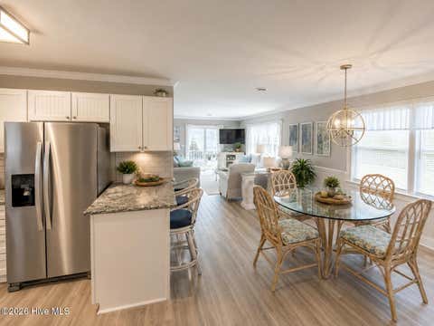 Tiny photo for 513 Canal Drive #Unit A1, Carolina Beach, NC 28428 (MLS # 100589445)