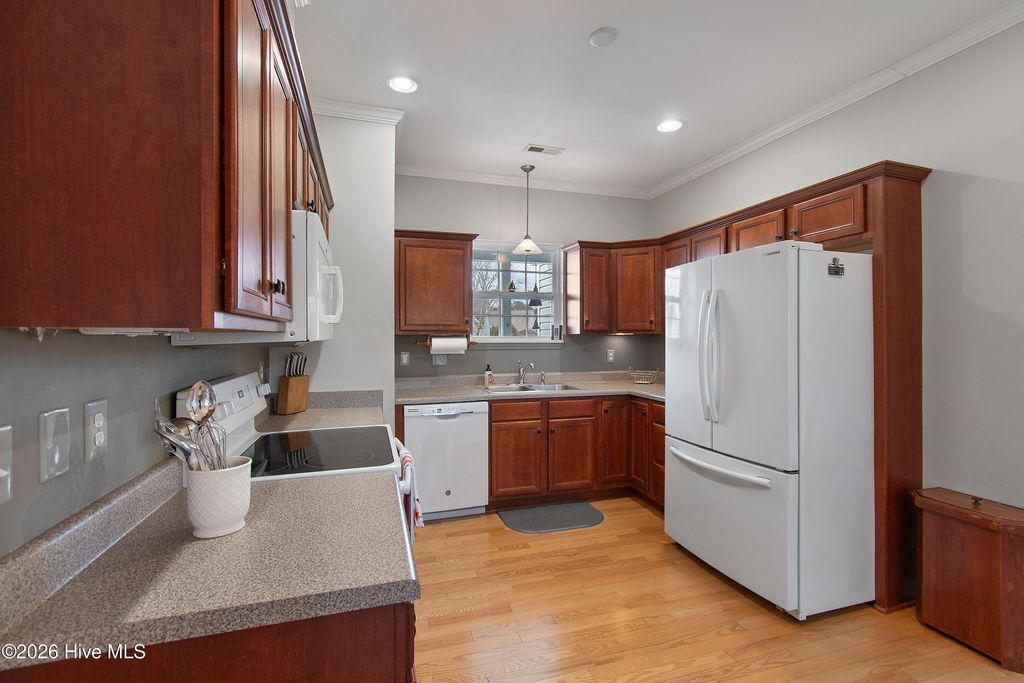 Photo of 4430 Spinnaker Street SE, Southport, NC 28461 (MLS # 100556789)