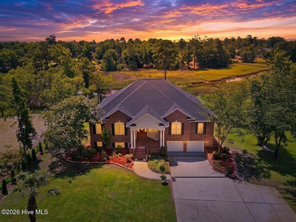 Photo of 609 Sawgrass Road, Hampstead, NC 28443 (MLS # 100589009)