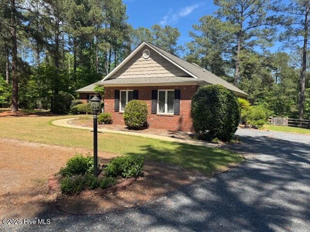 Photo of 50 Shadow Lane, Whispering Pines, NC 28327 (MLS # 100569978)