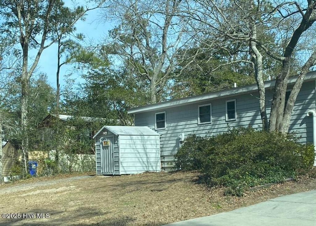 Photo of 7908 E Yacht Drive, Oak Island, NC 28465 (MLS # 100538347)
