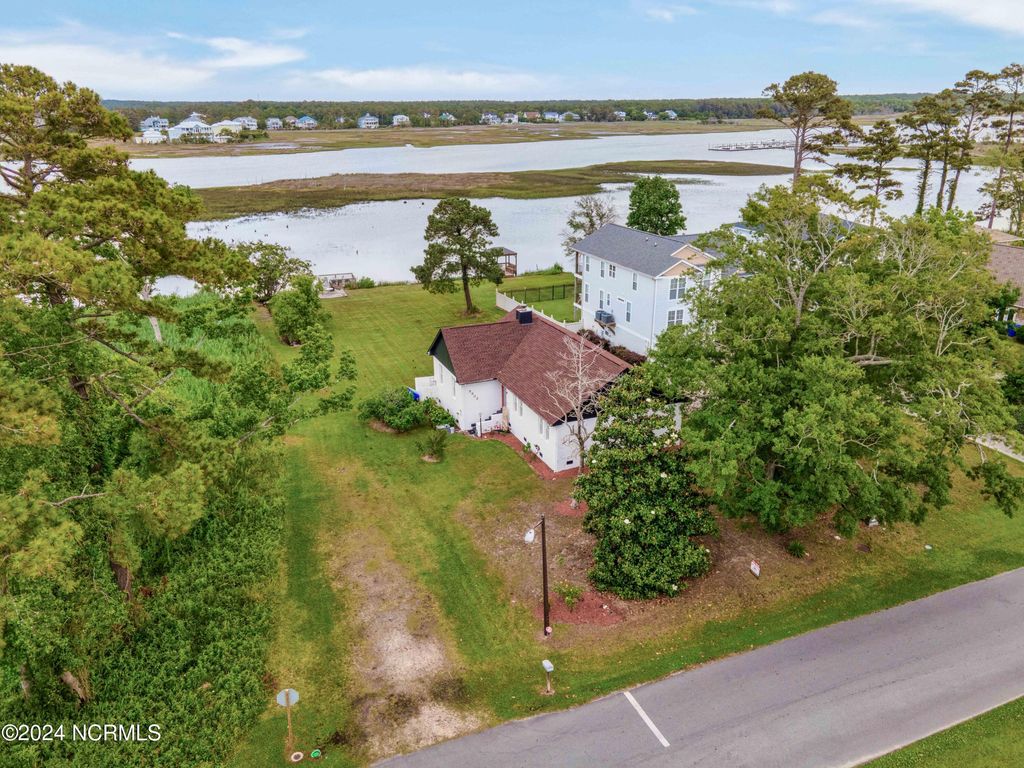 Photo of 5802 E Yacht Drive, Oak Island, NC 28465 (MLS # 100560914)