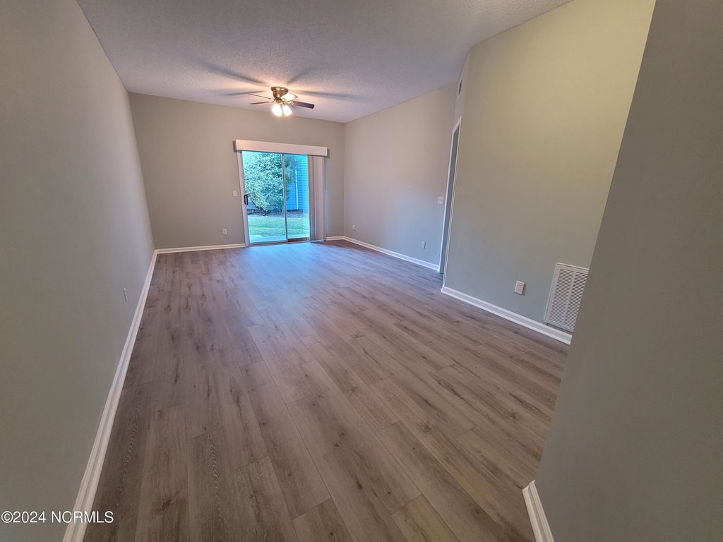 Photo of 4220 Wilshire Boulevard #106, Wilmington, NC 28403 (MLS # 100546926)