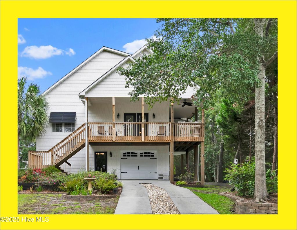 Photo of 104 SW 30th Street, Oak Island, NC 28465 (MLS # 100530554)