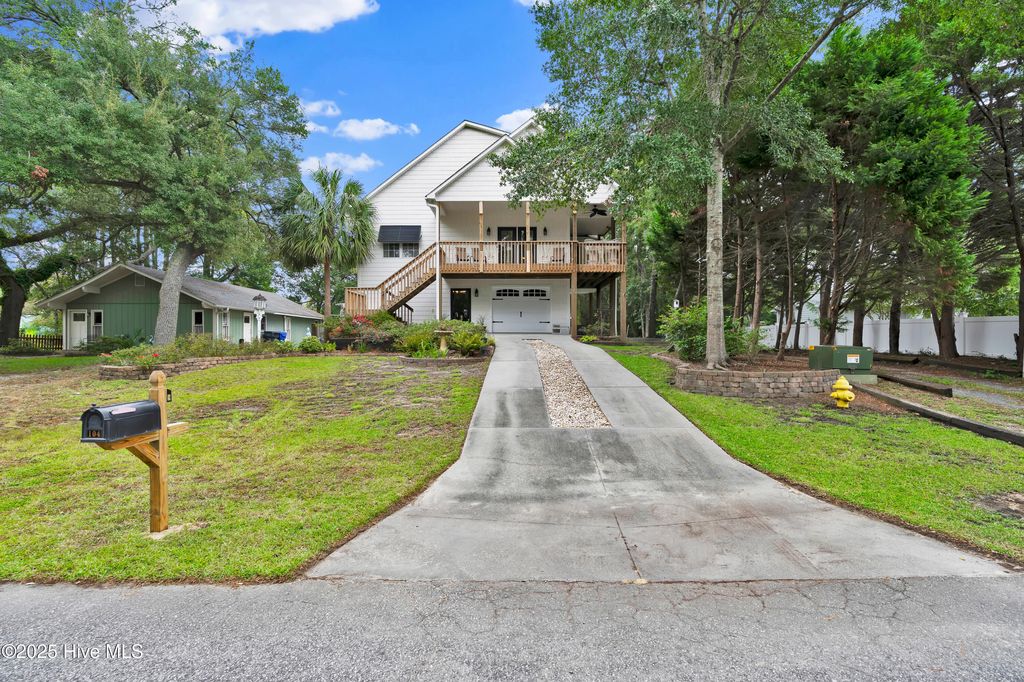 Photo of 104 SW 30th Street, Oak Island, NC 28465 (MLS # 100530554)